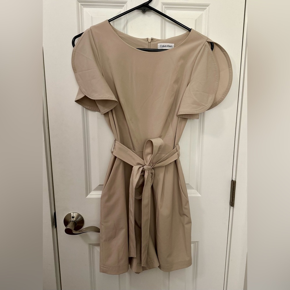 Excellent condition Calvin Klein beige romper size 2